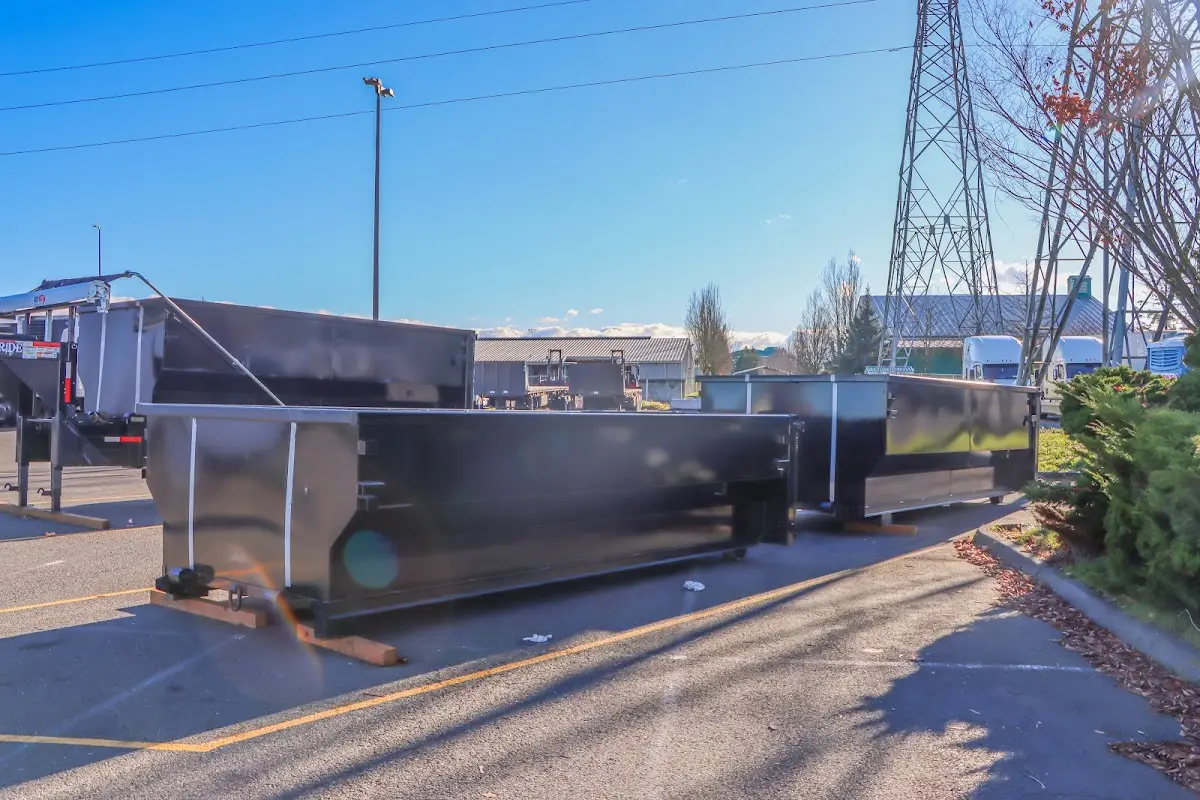 Roll-off dumpster ready for waste disposal at job site for Concrete Dumpster Rental in Gardiner